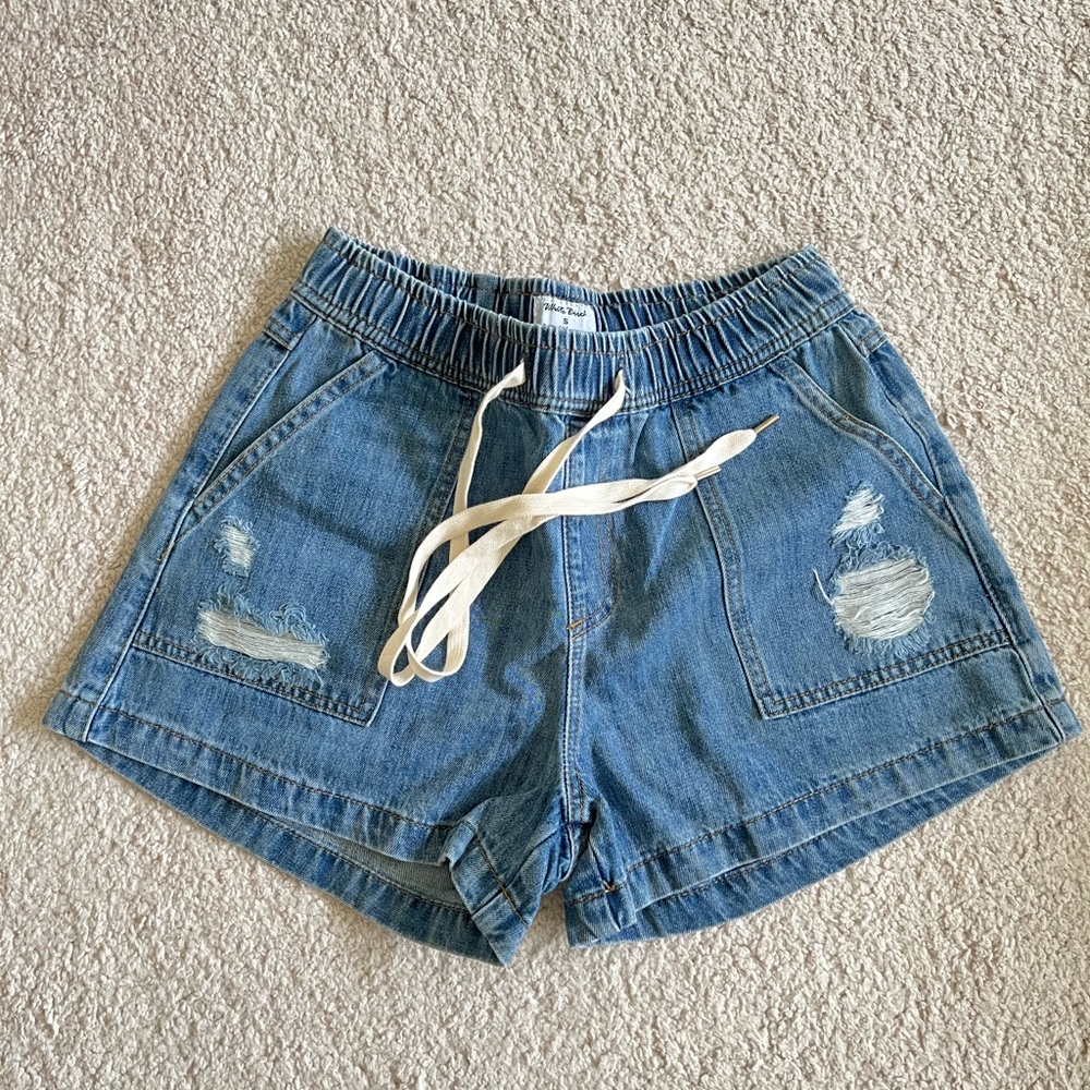 NEW, never worn denim garter/stretchy waist shorts with tie. Size small.